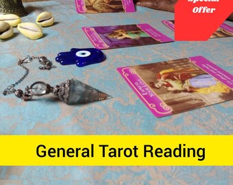 May include: A table setting for a tarot reading, featuring tarot cards, a pendulum, a blue evil eye charm, and seashells. The text "General Tarot Reading" is displayed on a yellow banner.