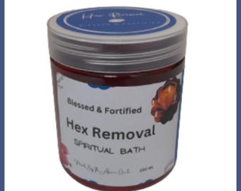 May include: A clear jar with a silver lid and a blue label on top. The jar contains a reddish liquid and has a label that reads "Hex Removal Spiritual Bath". The label also includes the text "Blessed & Fortified".