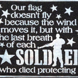 May include: Black and white patriotic quote with stars and a silhouette of a soldier. The quote reads "Our flag doesn't fly because the wind moves it, but with the last breath of each SOLDIER who died protecting it."