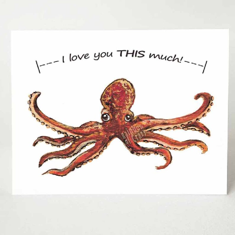 a greeting card featuring art of a red octopus with two tentacles stretched out. The card reads, "I love you THIS much!"