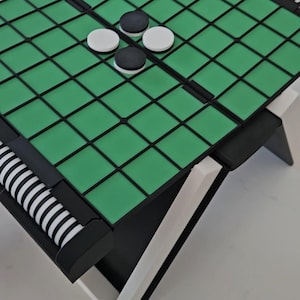"PlayBook'd" - Juego de Reversi (también conocido como Othello) impreso en 3D que parece un libro.