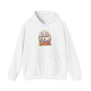 Self Care For The Undead Mummy Spa Halloween Hoodie, Funny Spooky Season Hoodie, Quirky Halloween Gift image 1