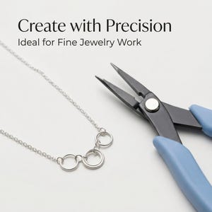May include: A silver necklace with three connected circles and a chain, next to black jewelry pliers with blue handles. The text "Create with Precision" and "Ideal for Fine Jewelry Work" is at the top.