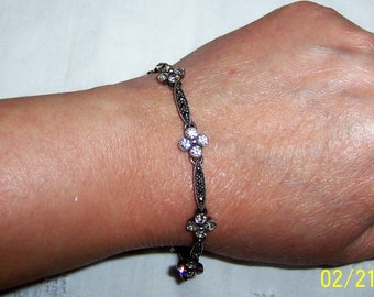 Vintage clear cubic zirconias and marcasites flower bracelet. Sterling silver. Signed.