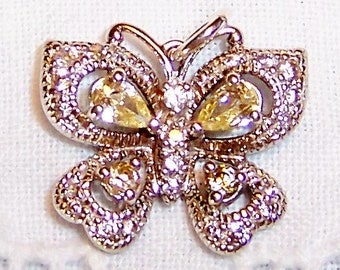 Vintage Light Yellow and clear cubic zirconias butterfly pendant. Sterling silver.