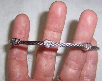 Vintage coiled bracelet with diamonds and 3 hearts. Sterling silver.