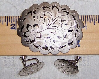 Vintage diamond cut flower brooch and earrings set. Sterling silver. Forstner brand.