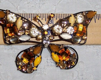 Vintage huge multi color rhinestones, butterfly brooch. Black metal. Joan Rivers. Signed.