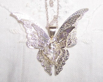 Vintage filigree butterfly pendant with chain. 3 layers of wings. Sterling silver.