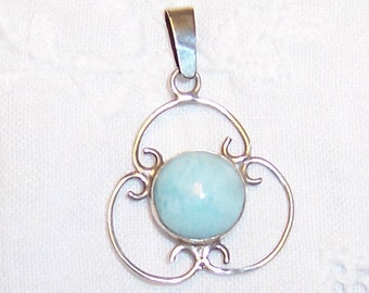 Vintage Natural Blue stone pendant. Sterling plated.