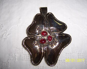 Vintage Artisan Made huge flower pendant with 3 red cabochons. Silver plated.