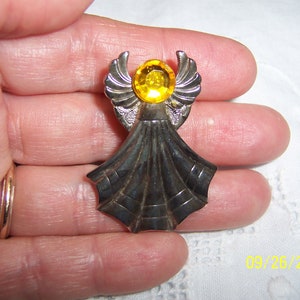 Vintage angel pin with yellow rhinestone. Silver metal. image 3