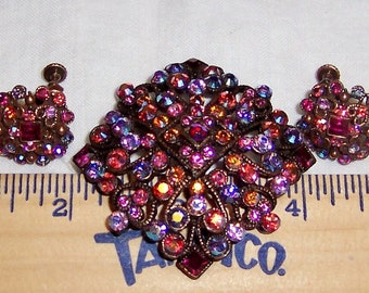 Vintage AB rhinestones brooch and earrings set. Copper color metal. Signed Joan Rivers.