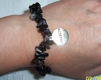 Vintage black agate and sterling charm bracelet. Strength. Stretchy.