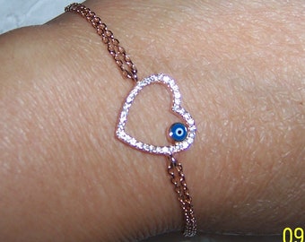 Vintage Clear Stones heart and evil's eye bracelet. Rose vermeil.