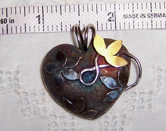 Vintage big and chunky, artisan made, heart pendant. Mixed metals.