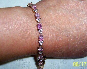 Vintage pink and clear cubic zirconias bracelet. Yellow gold over sterling silver.