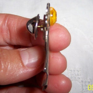 Vintage angel pin with yellow rhinestone. Silver metal. image 4