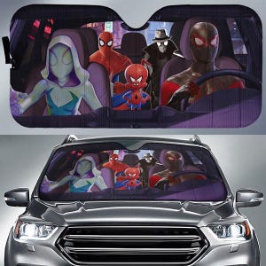 May include: A car sunshade featuring a colorful graphic of Spider-Man characters. The design includes Spider-Gwen, Spider-Man, and other characters from the Spider-Verse. The sunshade is shown installed in a car.