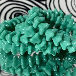 Turquoise Bell flower Beads 6x9mm Czech Glass 5 petal 25pc bellflower Uv reactive
