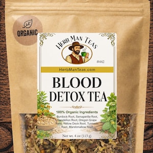 May include: A brown paper pouch of Herb Man Teas Blood Detox Tea with a clear window showing loose herbs. The label features a man holding a green cup, the text #442, HerbManTeas.com, and a list of ingredients including Burdock and Turmeric root.