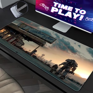 May include: A rectangular desk mat featuring a post-apocalyptic landscape with a figure in power armor and a dog walking toward a sunset. A sign reads Welcome Home. The scene includes a gas station structure and a distant city skyline under a cloudy sky.