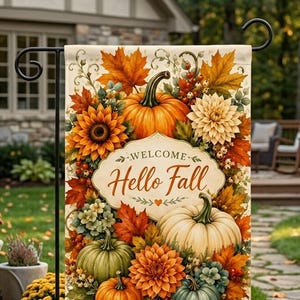 May include: A rectangular garden flag featuring a central cream-colored plaque with the text "WELCOME Hello Fall" in brown script. The design is surrounded by a vibrant arrangement of orange, white, and green pumpkins, sunflowers, and autumn leaves.