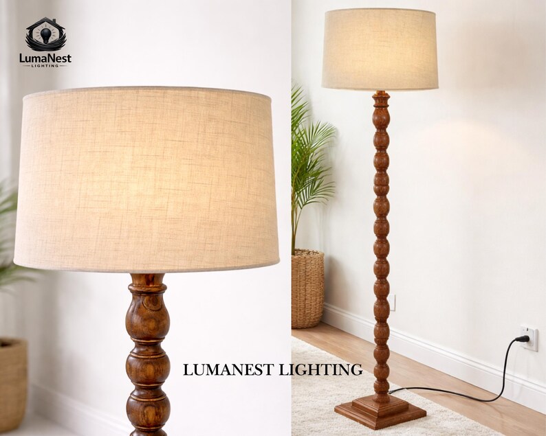 May include: A wooden floor lamp with a beige linen shade. The lamp has a dark brown, turned wood base and a square base. The text "LumaNest Lighting" is visible on the image.