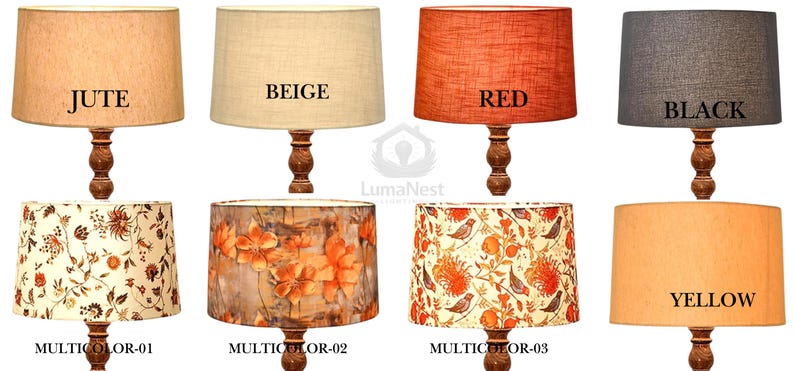 May include: A collection of lamps with various shades, including jute, beige, red, black, yellow, and floral patterns. Each lamp has a wooden base and a fabric shade. The shades are labeled with their respective colors or patterns.