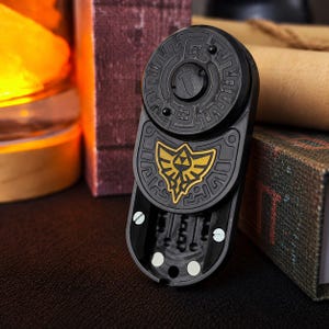 Evolza Metal EDC Fidget Slider – Tuning Fork Mechanism, Shield Design, 90g
