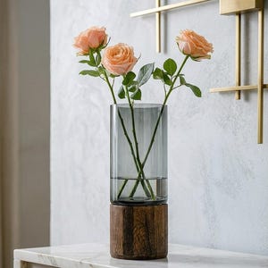 May include: A rustic wooden sign with the text "Welcome to our home" in white lettering. The sign features a distressed finish and a simple, inviting design, perfect for a front porch or entryway.