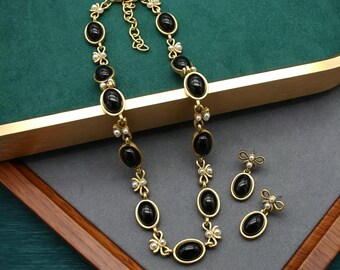 Goud zwart glazen strikketting oorbellen set, sieraden uit het midden van de eeuw vintage stijl