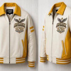 May include: An off-white and mustard yellow jacket with a full-length front zipper, a mustard collar, and striped cuffs. The chest features an embroidered Avirex 75 Aviator's King logo with a crown and wings emblem on a dark background.