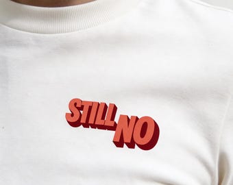 STILL NO T-Shirt – Minimalist Vintage Typography Pocket Print Tee (Off-White)