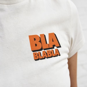 BLA BLA BLA T-Shirt – Minimalist Vintage Typography Pocket Print Tee (Off-White)