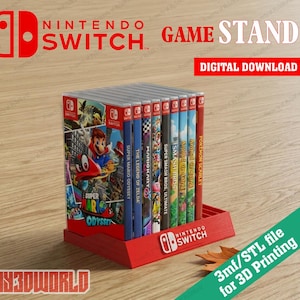 May include: Red Nintendo Switch game stand holding several game cases. The stand has the Nintendo Switch logo and the text "GAME STAND" and "DIGITAL DOWNLOAD". The game cases include "Super Mario Odyssey" and "Pokemon Scarlet".