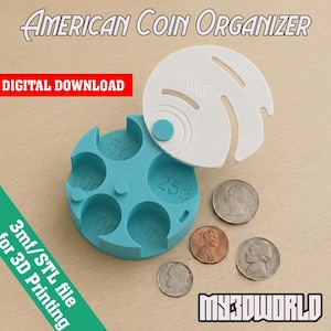 May include: A teal 3D-printed American coin organizer with labeled slots for different coin denominations. The organizer has a white lid and includes the text "AMERICAN COIN ORGANIZER" and "DIGITAL DOWNLOAD". Several US coins are displayed next to the organizer.