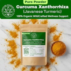 May include: A package of Curcuma Xanthorrhiza (Javanese Turmeric) powder with a wooden bowl of turmeric powder. The package has a green label with text and a QR code. The text reads "100% Organic WildCrafted Wellness Support".