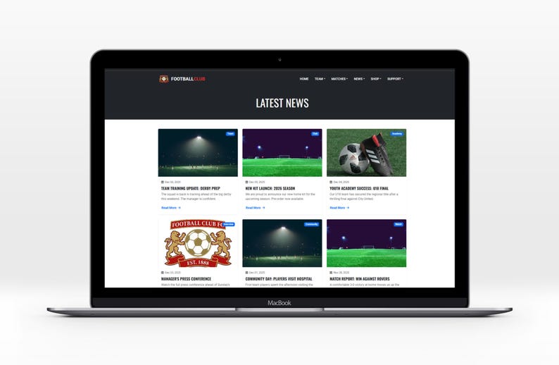 May include: A MacBook laptop showing a football club website. The website has a dark theme and displays "LATEST NEWS". The articles include images of a football, boots, and a football pitch. The website's logo is visible.