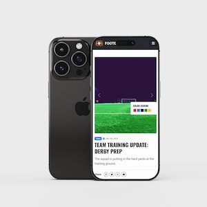 May include: A black smartphone showing a sports news app with a green field and the text "TEAM TRAINING UPDATE: DERBY PREP." Beside it is a black smartphone with a triple-lens camera.