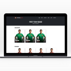 May include: A MacBook laptop screen displays a football team's first team squad on a website. The site shows player photos and names, grouped by position, with a dark grey header and a white background.