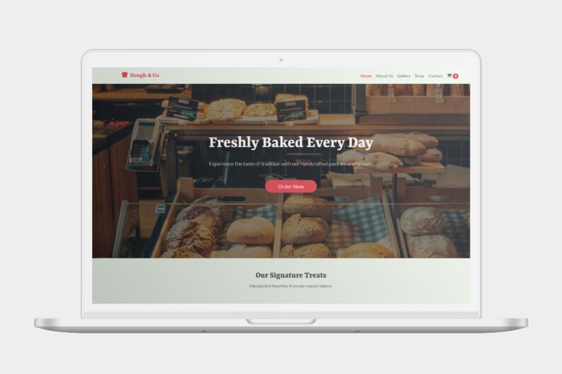 K&ouml;nnte beinhalten: Ein Laptop-Bildschirm zeigt eine B&auml;ckerei-Website mit dem Text "Freshly Baked Every Day". Die Website zeigt Bilder von Brot und Geb&auml;ck. Ein roter "Order Now"-Button ist sichtbar.