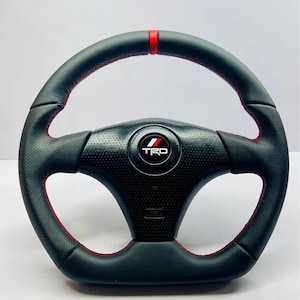 TRD Toyota Celica,MR-2, Supra, JZX, MK4, Matrix Carbon Fiber Steering Wheel.