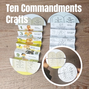 May include: A white ceramic mug with a black handle and the text "But First, Coffee" in a bold, black font. The mug is set against a neutral background, highlighting its simple design.