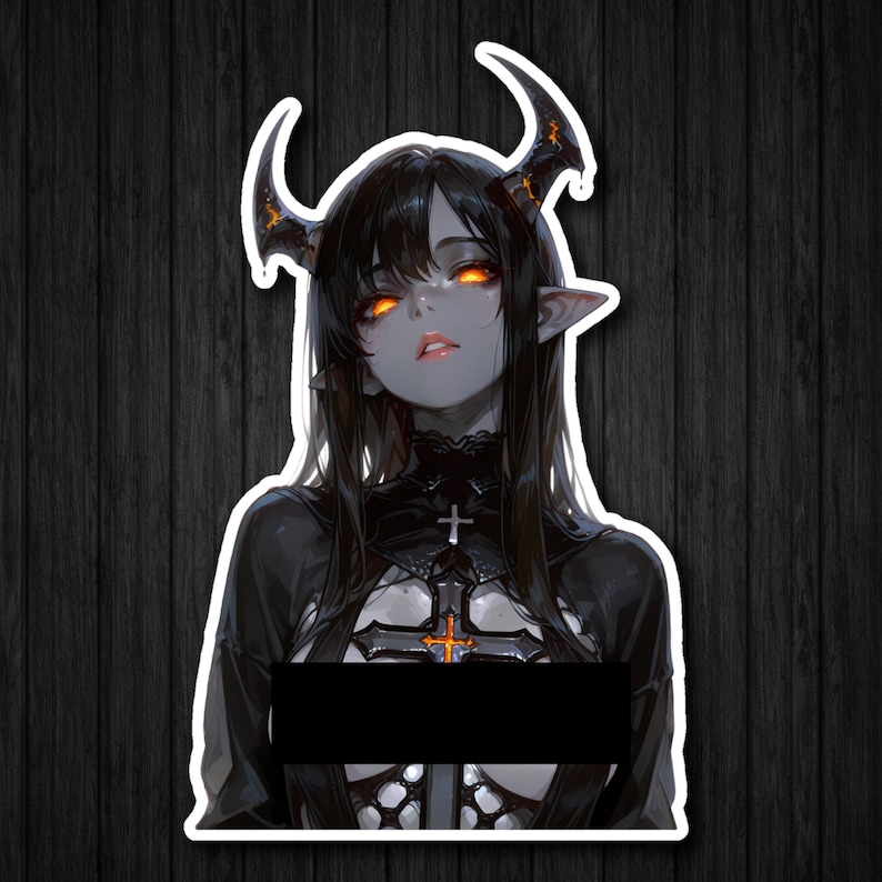May include: A sticker depicting a female demon with black hair, orange eyes, and horns. She is dressed in a black outfit with a cross pendant. The image has a white border and is set against a dark wood grain background.