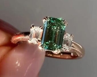Green Emerald Cut Moissanite Three Stone Engagement Ring, Yellow Gold Double Prong Diamond Look Ring, Personalized Gift for Her.