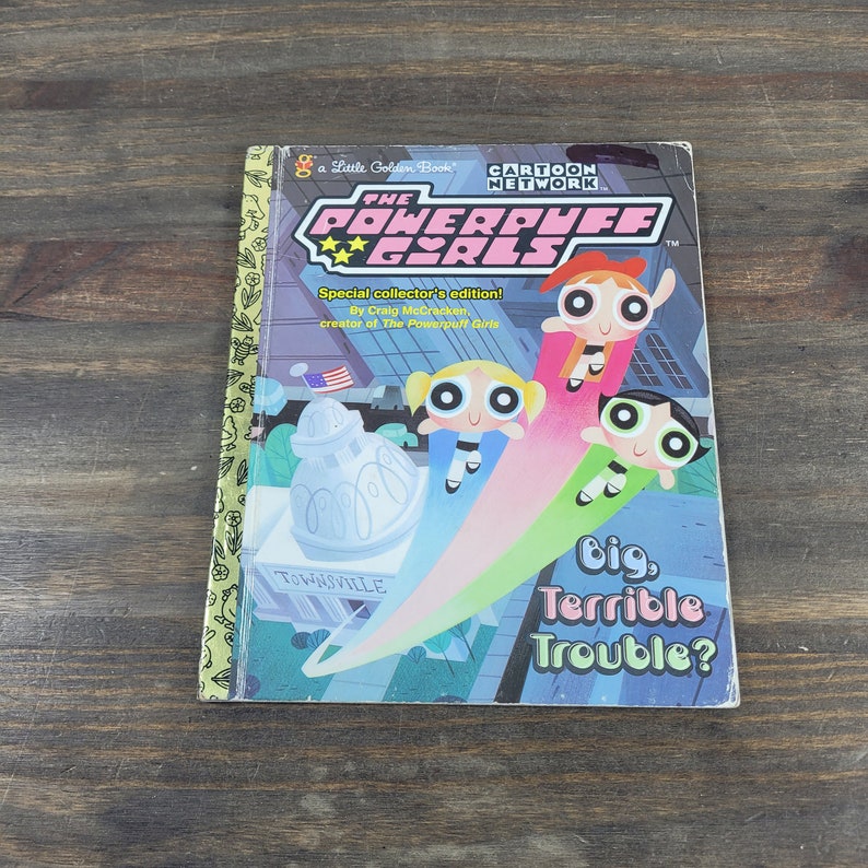 May include: A Little Golden Book featuring the Powerpuff Girls, a cartoon series from Cartoon Network. The cover shows the three girls flying through the air, with the text "Big, Terrible Trouble?" at the bottom.