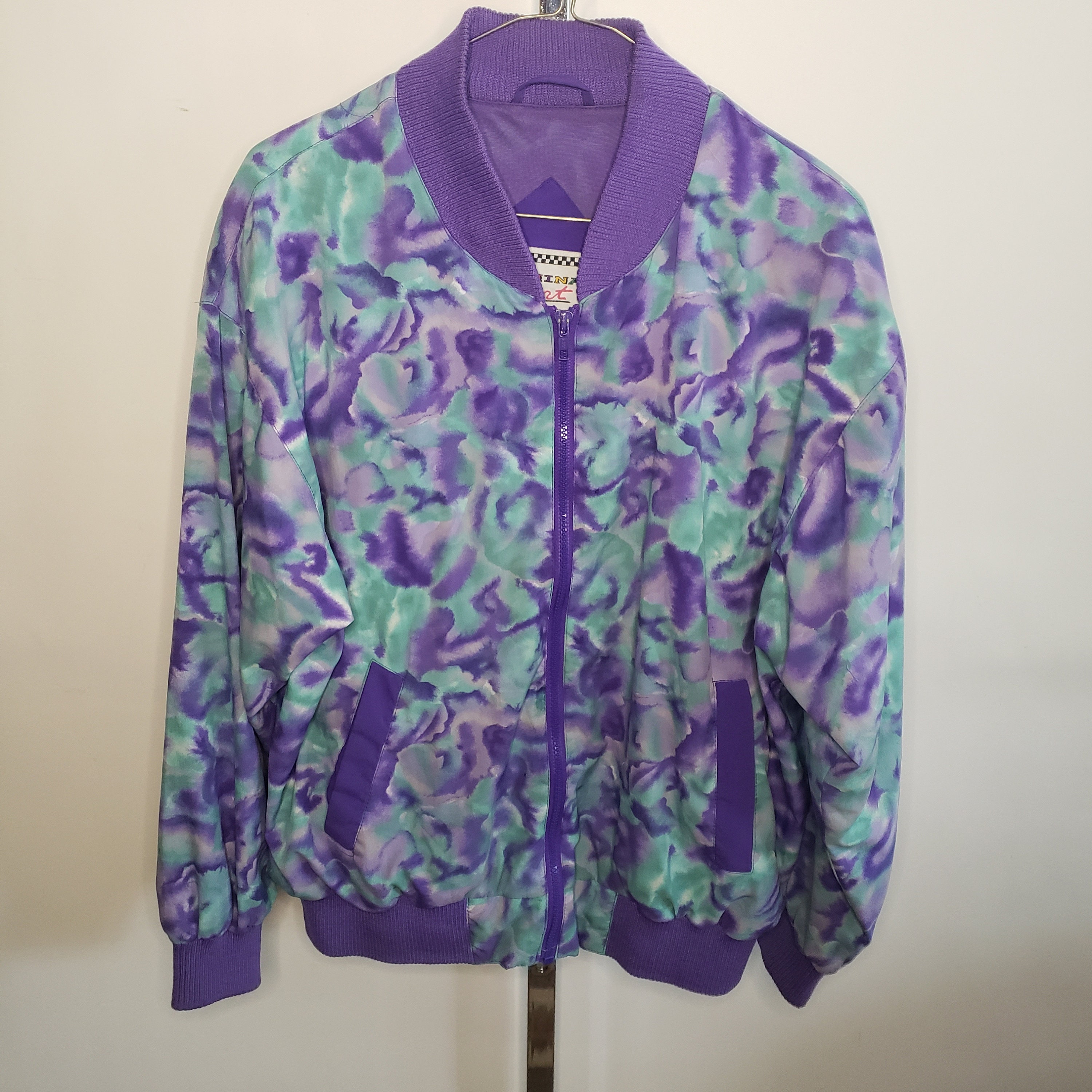 purple and turquoise jacket