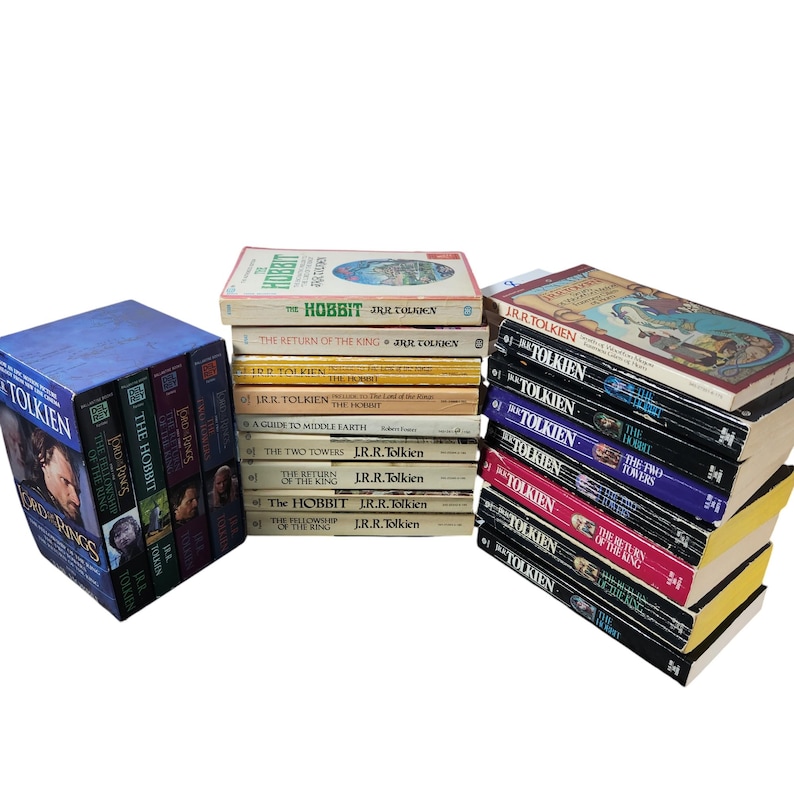 May include: A stack of 18 paperback books by J.R.R. Tolkien, including "The Hobbit", "The Lord of the Rings", and "The Silmarillion".