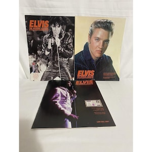 May include: Three Elvis Presley catalogs are displayed. The top left catalog cover features Elvis in a black leather outfit, holding a microphone. The top right catalog cover shows a portrait of Elvis. The bottom catalog cover shows Elvis in a white outfit.